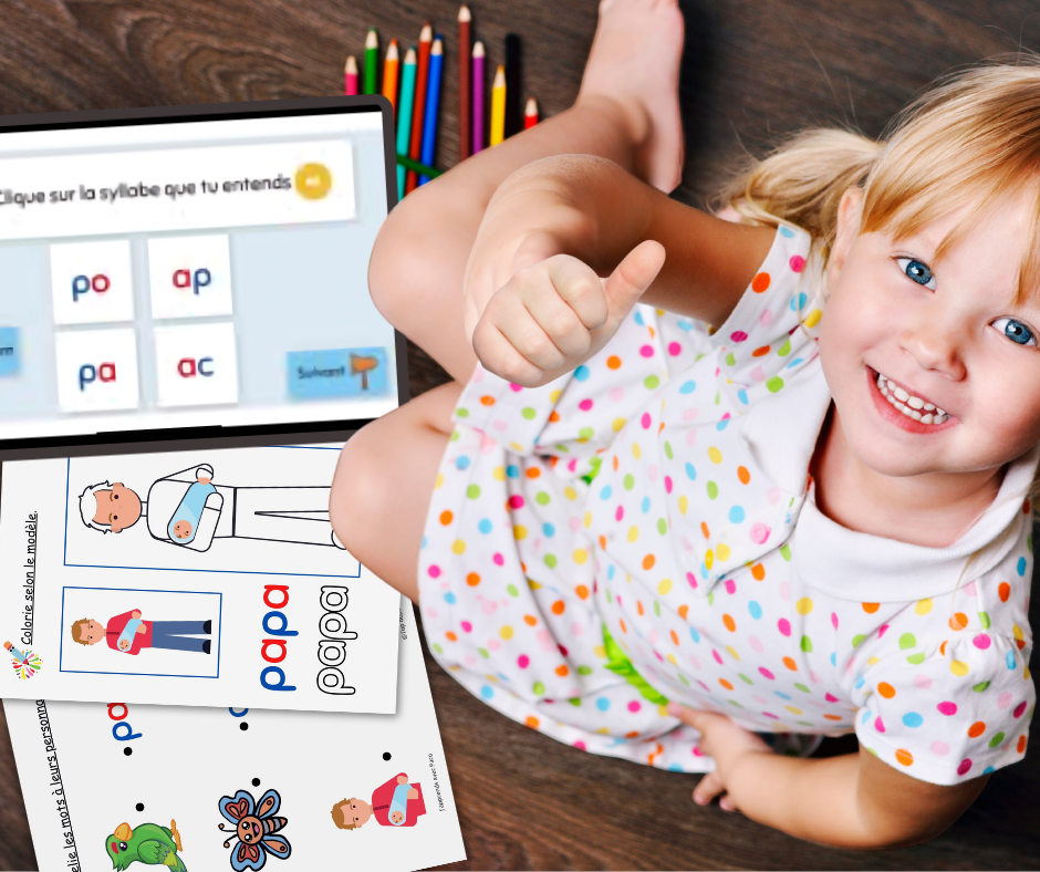 Fillette qui joue à un jeu sur une tablette pour apprendre les syllabes